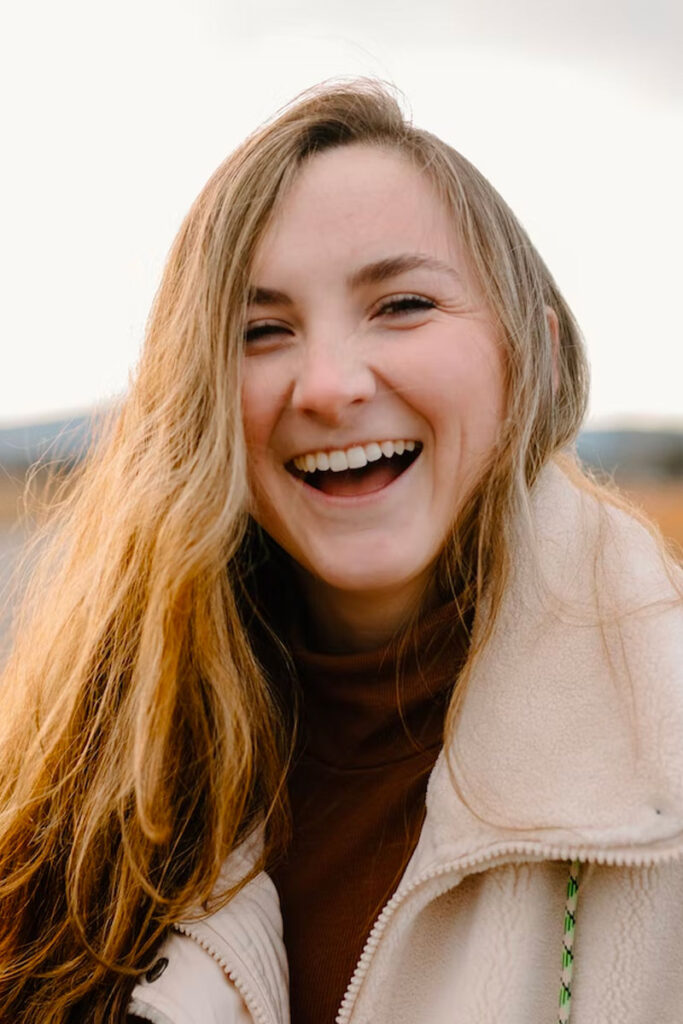 smiling patient with tooth extractions